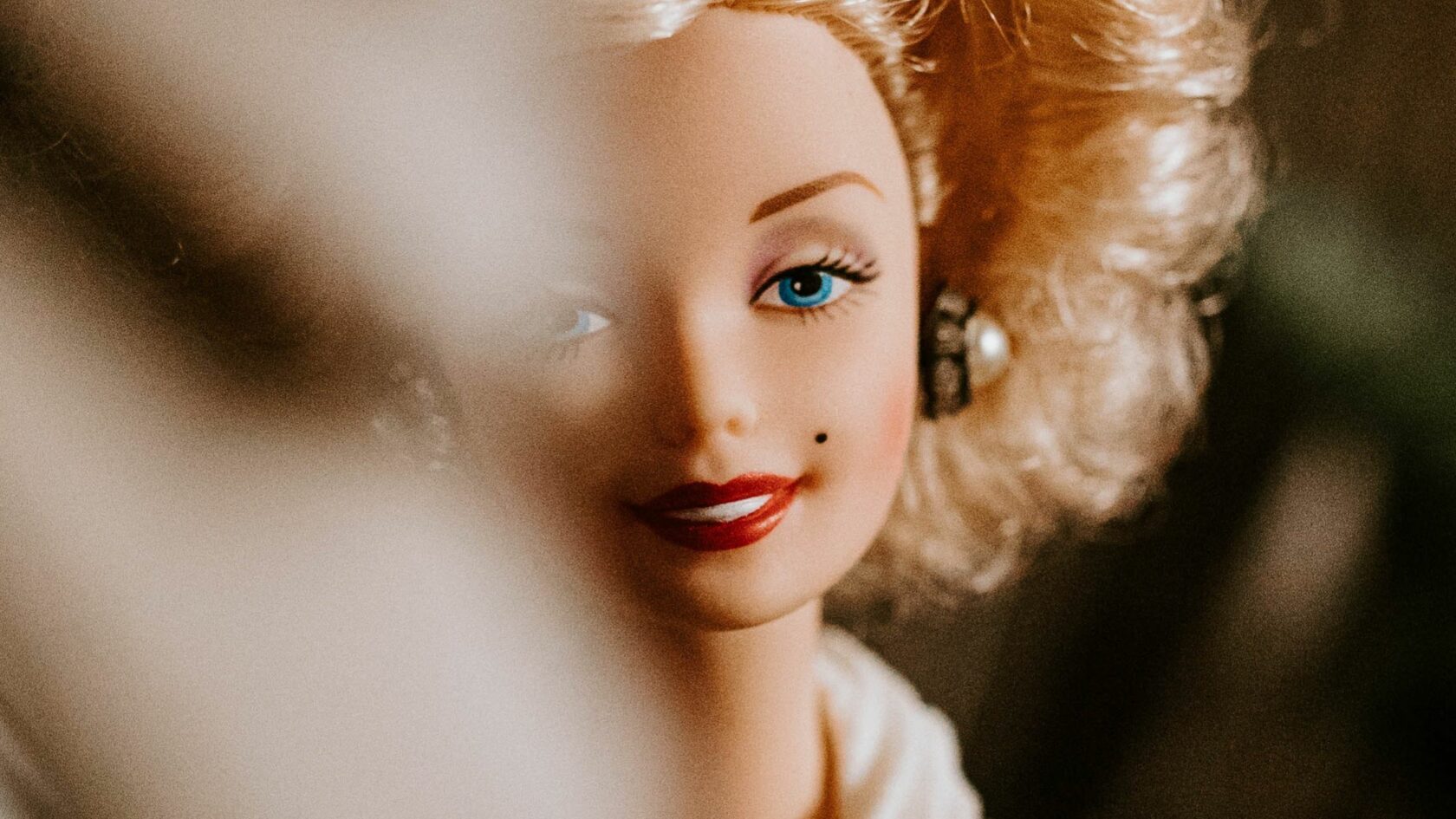 vintage barbie doll with blond hair and blue eyes