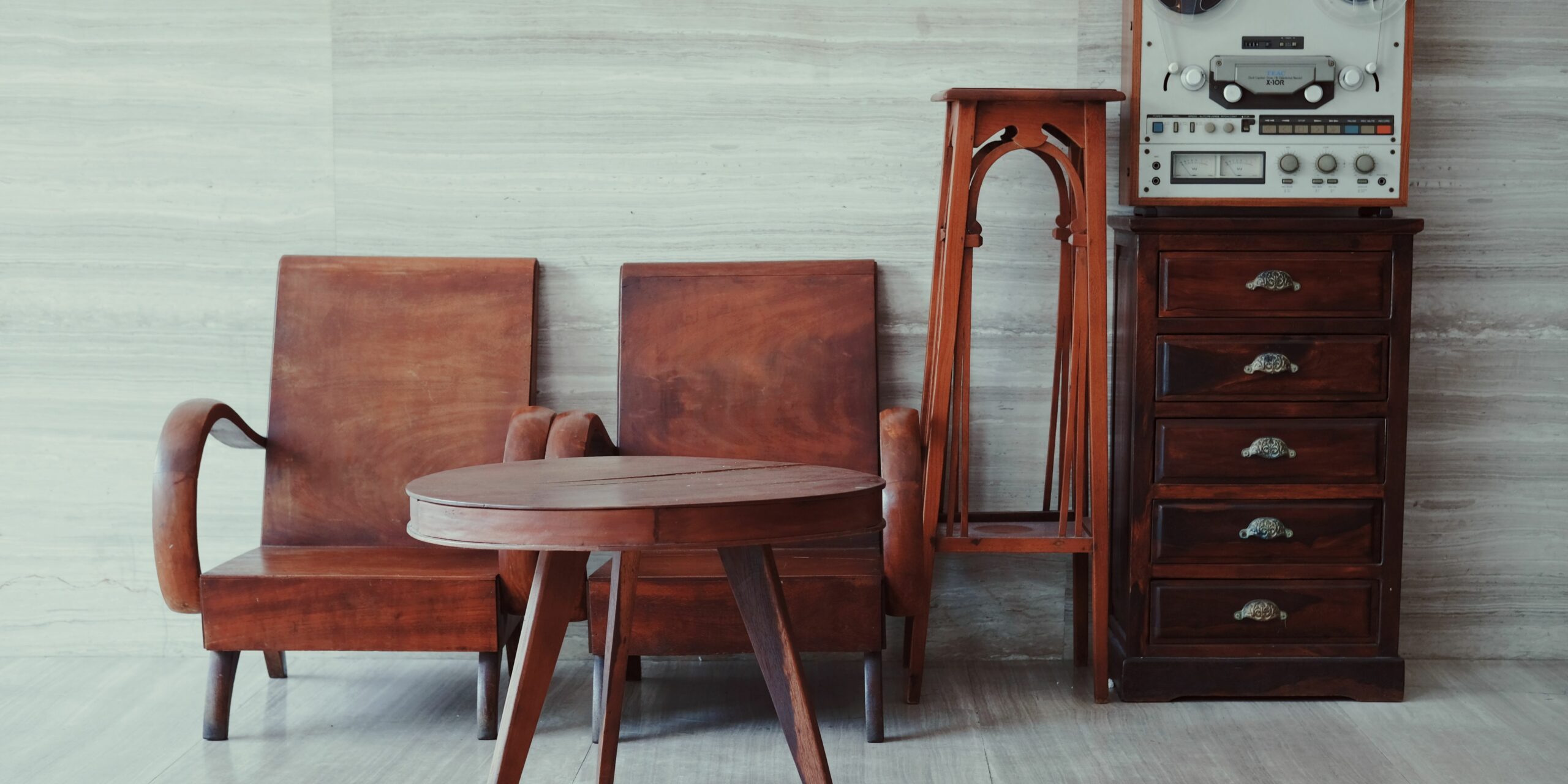 a group of antique wood furniture